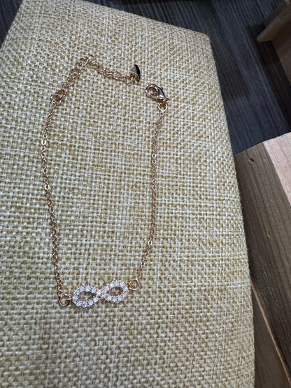Pulsera Infinito Oro laminado y Zirconias